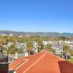 Charming Two-Bedroom Apartment With Balcony And Garage By The Marina